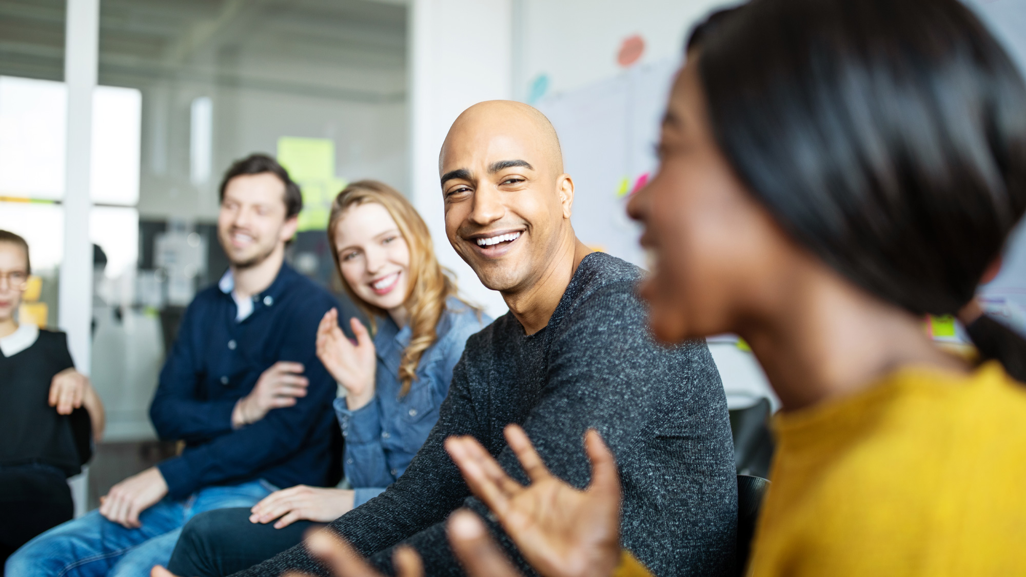 people in group speaking